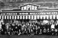 a group outside the Empire Theater